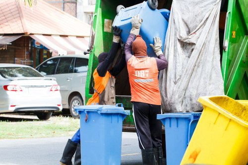 Office clearance team efficiently managing workspace